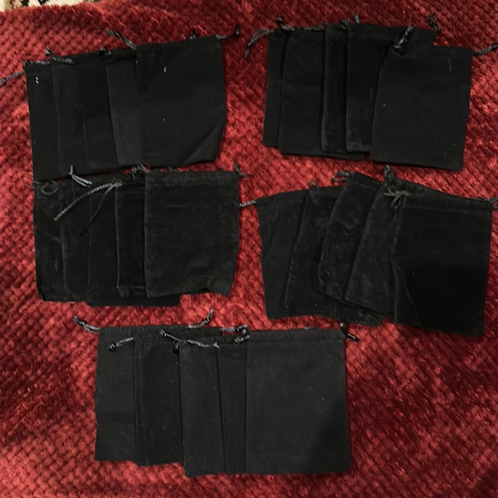 Sets of 5 black, velvet-like drawstring jewelry bags